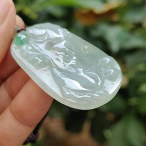 Crafted with pair of fish on Natural Type A Jadeite Jade as pendant certificate weighs 13.22 grams measurement 42.8 * 30.3 * 5.2 mm (pendant343)