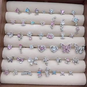 Nút thắt nơ đính kim cương và zircon khuyên rốn hình trái tim   Nhẫn rốn phong cách gợi cảm dành cho nữ   Trang sức xỏ khuyên cá nhân hóa theo phong cách riêng   Một món đồ không thể thiếu cho những tín đồ thời trang có khuyên tai.