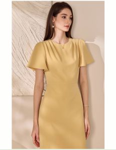 Đầm dự tiệc dáng ôm phối tay bồng màu vàng cổ tròn