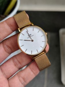 Đồng hồ nữ D.W 2 kim kính saphia mặt tròn chạy pin hàng si