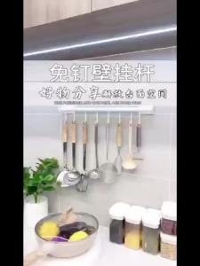 Kitchen pole wall mounted storage rack cookware hook hole free wall storage chopping board spoon shovel hanging rack artifact