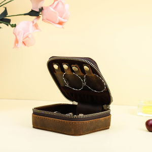 ติดต่อครอบครัว Retro 100% หนังวัวกล่องเครื่องประดับอัญมณีหูต่างหูเม็ดกลมจัดเก็บเครื่องประดับแสดงกรณี Travel กล่องเครื่องประดับแบบพกพา