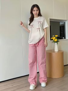 ชุดเซ็ตแฟชั่น สไตล์เกาหลี เสื้อลายโบว์หวานๆตัดกับกางเกงลายตารางสุดคิ้วท์