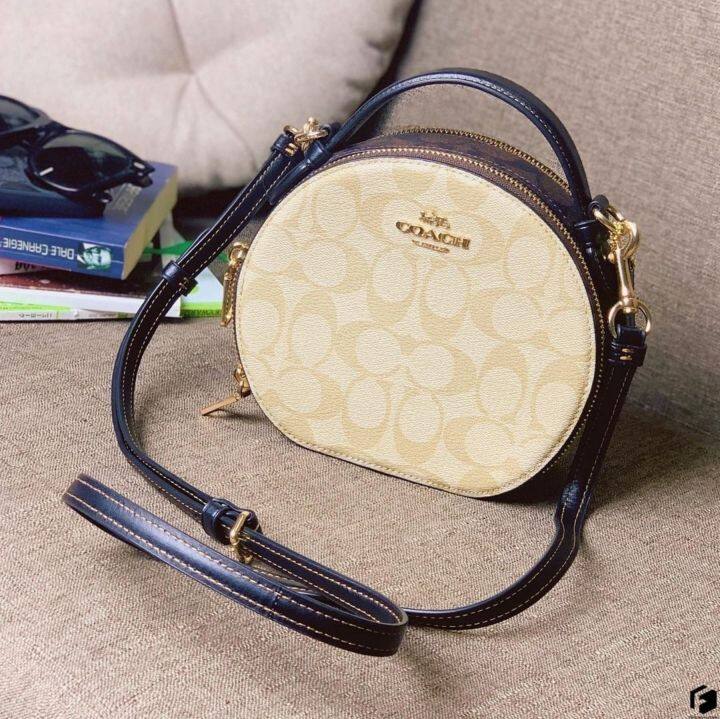 Coach round store sling bag