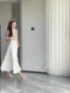 Ammin 2024 mùa xuân lưới giữa Chiều dài váy cho cho nữ phiên bản Hàn Quốc của đàn hồi cao eo A-line váy với mặt bích cạnh