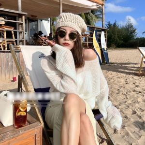 IELGY Simple one-shoulder hollow thin knitted sweater for women