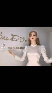 Áo dài gấm trắng tay phồng