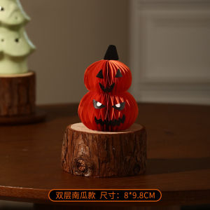 Halloween pumpkin lantern-themed decorations ghost costumes small ornaments shop scene arrangements and tabletop photo props