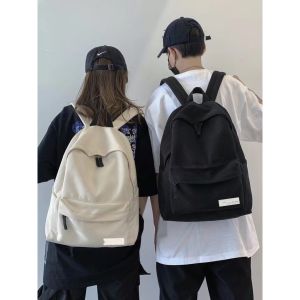 Schoolbag for girls Korean version of the backpack for boys simple and stylish versatile campus ins wind backpack.