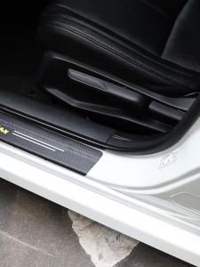 Car threshold strip anti-stepping protection sticker carbon fiber grain leather sticker welcome pedal scratch resistant cartoon decorative strip universal