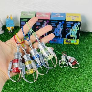 YAOO ประเภทกดกด จับตุ๊กตาเล็บจำลอง การจำลองแบบจำลอง มินิมินิ พวงกุญแจเครื่องกรงเล็บ จี้กระเป๋าเป้สะพายหลัง สีแบบสุ่ม คว้าพวงกุญแจกรงเล็บ กระเป๋าโรงเรียนกระเป๋า