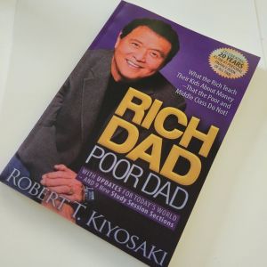 RICH DAD POOR DAD by Robert Kiyosaki book shelf rack bookmark book depository