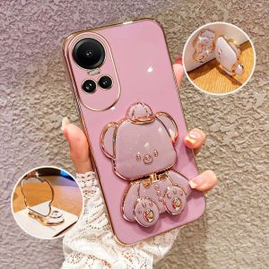 YBD เคสโทรศัพท์สำหรับ OPPO Reno 10 10 Pro + Plus 5G เคสแฟชั่นหมวกน่ารักที่ตั้งรูปหมีสวยงามหรูหราดีไซน์ชุบ