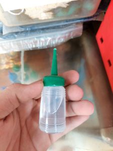 chai dầu tra máy quạt máy may ổ khóa.