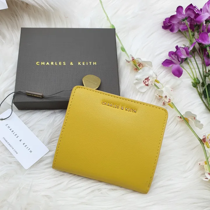 Charles and keith store yellow wallet