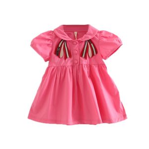 Váy bé gái đũi hồng thêu nơ ngực XHN904