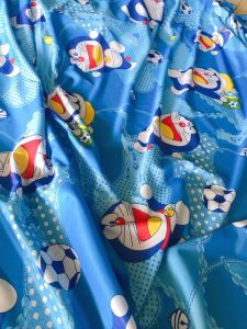 Rido - Màn che vải thun dày mịn kich thước ngang 32m cao 2m doremon xanh như hình
