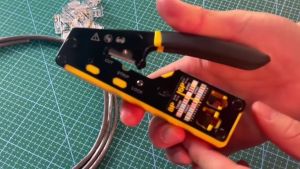 ZoeRax RJ45 CAT6/5E Network Tool Kit including crimping pliers wire strippers blades as well as 20 CAT6 and CAT5 connectors and plug protectors