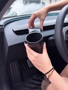 Suitable for 2025 Tesla Model y Juniper Central control instrument panel water cup holder air outlet cup holder storage car supplies