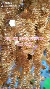 Dây kim tuyến kết hoa mai vàng trang trí lễ tết tiệc đẹp