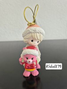 Precious Moments girl with a pink care bear in Christmas wreath hanging ornament
