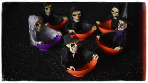 Spooky Motion Activated Skeleton Candy Holder with Screaming Skull and Light Up Red Eyes for Halloween Decorations