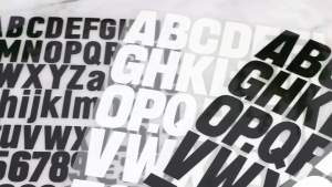 30 Sheets Iron on Letters 1200Pcs Iron on Letters for Clothing Vinyl 1.6 Inch Heat Transfer Letters A-Z PU Alphabet Stickers Heat Press for T ShirtsJerseysFabricHatsCraftsRibbon (Black/White)