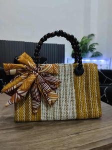 Franchescas Collection  Handcrafted woven bag with beaded handles