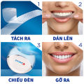 Set đèn và miếng dán trắng răng Crest Crest 3D White Whitestrips With Light Dental Whitening Kit. 