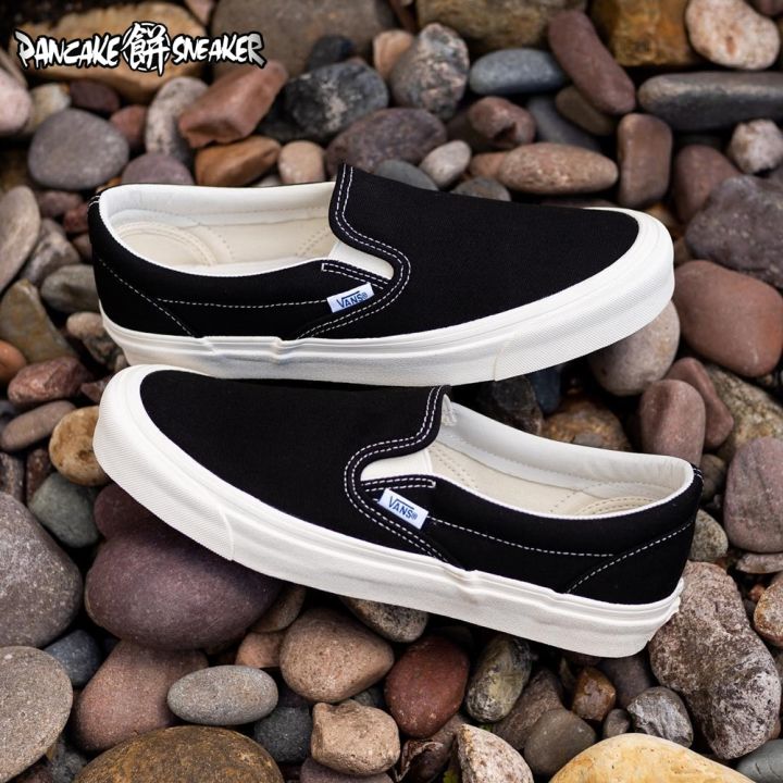 Vans og black hot sale slip on