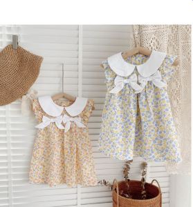 Váy Hoa Bé Gái Mùa Hè Thiết Kế Cổ Sen Nơ Ngực Size 8-23kg