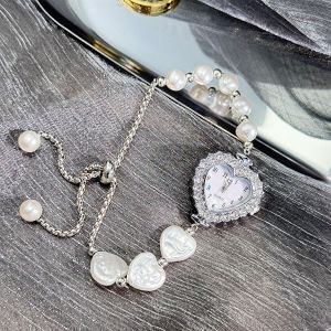 นาฬิกาแฟชั่นกำไลไข่มุกหรูหราสำหรับผู้หญิงนาฬิกาควอตซ์แฟชั่นใหม่ปรับสายยางยืดสำหรับออกกำลังกายนาฬิกาข้อมือลำลองของผู้หญิง