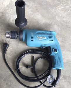 สว่านกระแทกไฟฟ้า Hammer Dril 5/8" Made in Thailand ยี่ห้อ Makita รุ่น M0801B