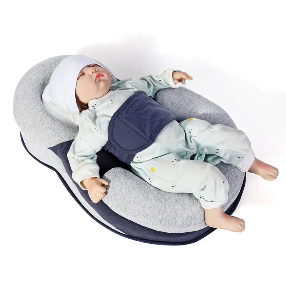 Crib sleep outlet positioner