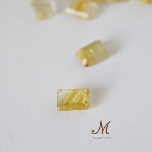 พลอยแท้ไหมทองเจียระไนหลังเบี้ย ขนาดพลอย 7*5 มิล พลอยแท้เสริมดวง พลอยสำหรับฝังตัวเรือน พลอยแท้เสริมดวง พลอยดิบ