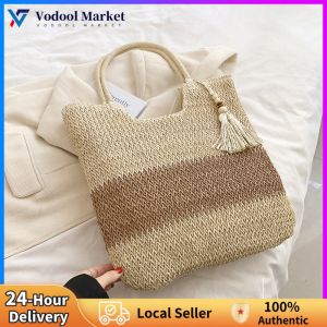 Fashionable Women Tote Bag with Large Straw Woven Body and Tassels for Casual and Holiday Wear