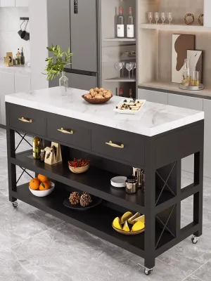 Marble island kitchen with open dining table and movable table kitchen table with storage and sideboard.