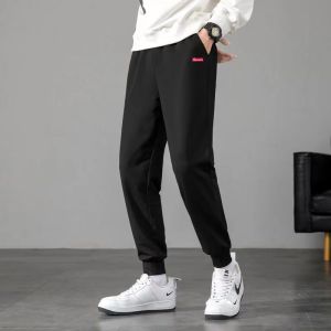 กางเกงผู้ชายกางเกงหนาฤดูหนาวใหม่แนวโน้มลําลองป่าขนาดใหญ่กางเกงกีฬา