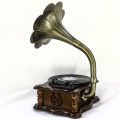 Đài loa kèn chạy đĩa than cổ, đầu đọc đĩa than.