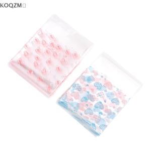 🔥🔥🔥 ถุงขนมใสรูปหัวใจ100ชิ้นถุงพลาสติกสำหรับอบขนมบิสกิตตกแต่งบรรจุภัณฑ์แบบมีกาวในตัว