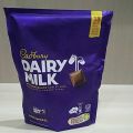 Cadbury Dairy Milk 81 gram - Coklat Susu Kemasan Pouch Isi 18 Pcs - Snack Rendah Gula. 