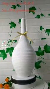 Lọ cắm hoa thể loại dáng chai hàng men trắng cao 35cm đường kính 15cm gốm sứ Bát Tràng