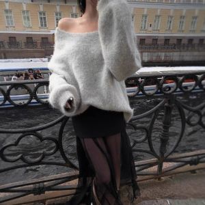 IELGY Lazy style backless bow design long sleeve loose sweater for women