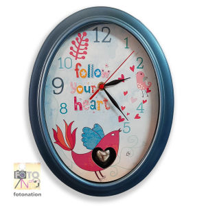 Pendulum Wall Clock with message "Follow Your Heart". Nice gift idea for housewarming newly-weds. With heart pendulum