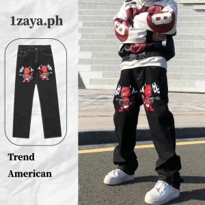 ยีนส์ลายหัวกะโหลกสำหรับผู้ชาย แฟชั่นกางเกงทรงตรงสำหรับผู้ชาย กางเกงยีนส์ฮิปฮอปสำหรับผู้หญิง กางเกงลำลองสตรีทสูงสำหรับผู้ชาย