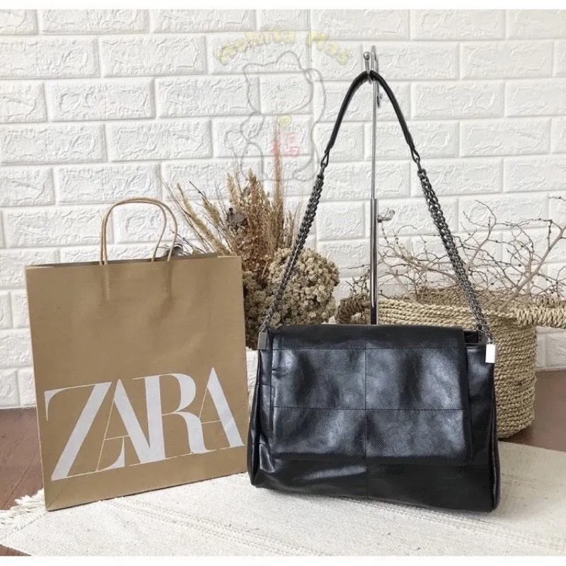 zara rocker zara rubber bag
