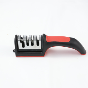 Compact Wall Mountable Knife Sharpener for Small Kitchen Space Saving Solution. Black and red design. Three slots for sharpening. Wall mountable. Fits small kitchen spaces.