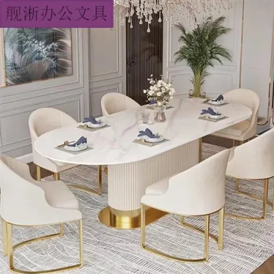 Luxurious modern simple and bright slate dining table and chair combination oval household small-sized French cream wind dining table.