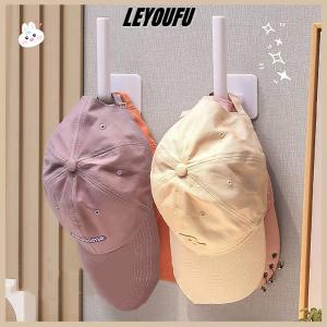 LEYOUFU 1ชิ้นที่วางหมวกตะขอติดผนังแบบเหนียวสำหรับหมวกเบสบอลหมวกแบบลำลองตะขอเก็บของฟรีหมัดสำหรับแขวนประตูตู้เสื้อผ้าแบบพกพา