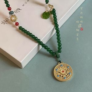 AE Dây chuyền mặt tròn phong cách cổ điển Trung Quốc mới dành cho nữ phù hợp với váy Ma Mian Hán phục sườn xám dây chuyền áo len phụ kiện phong cách cổ xưa và dân tộc.
